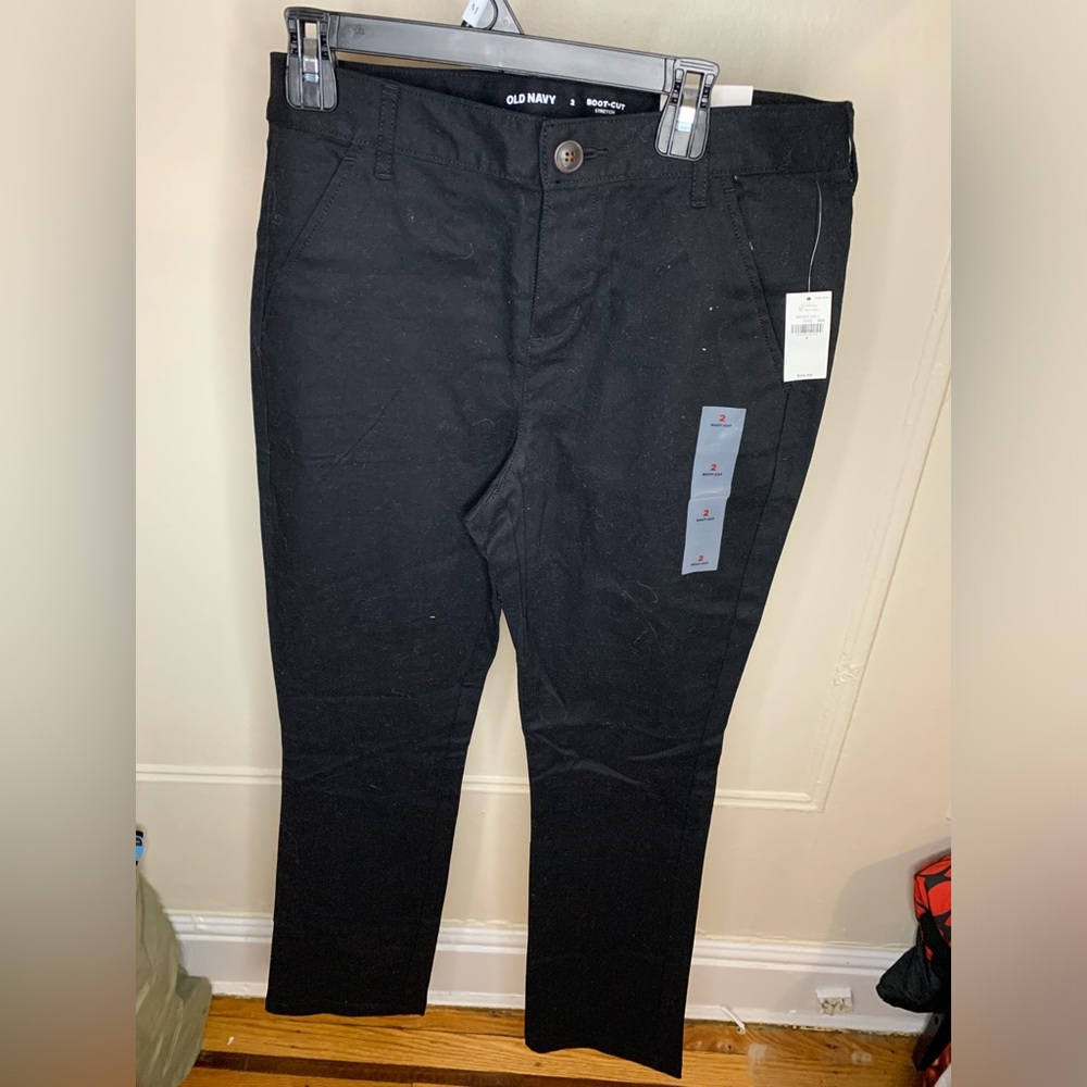 Black boot-cut pants stretch size 2 
Never worn 
New with tag